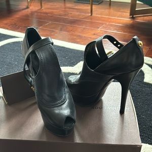 Runway shoes only made a few in the United States   Only worn 4 times like new !